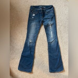 American Eagle stretch dark denim ”artist” jeans with holes